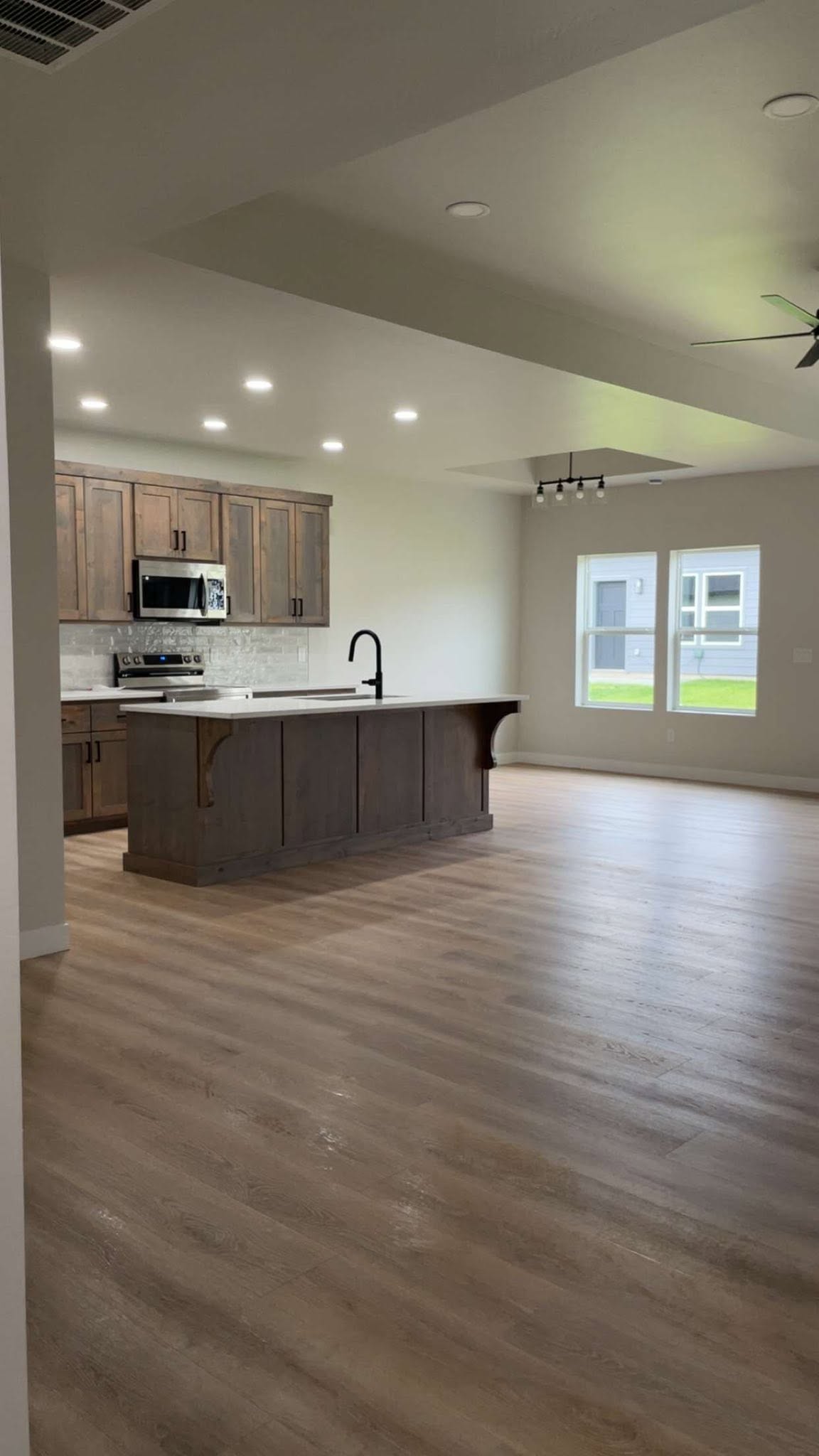 Bright, spotless kitchen and living space cleaned by Cruz Cleaning